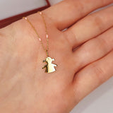 Close up of 9ct Gold Little Girl Pendant on 9ct Gold chain with Pink Enamel detail