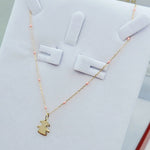 9ct Gold Little Girl Pendant on 9ct Gold chain with Pink Enamel detail