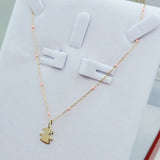 9ct Gold Little Girl Pendant on 9ct Gold chain with Pink Enamel detail