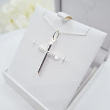 Close up of Sterling Silver Cross with Rope Design for Holy communion jewellery for boys and girls