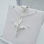 Close-up of sterling silver crucifix cross pendant - Communion or Confirmation gift