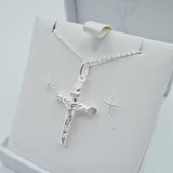 Close-up of sterling silver crucifix cross pendant - Communion or Confirmation gift