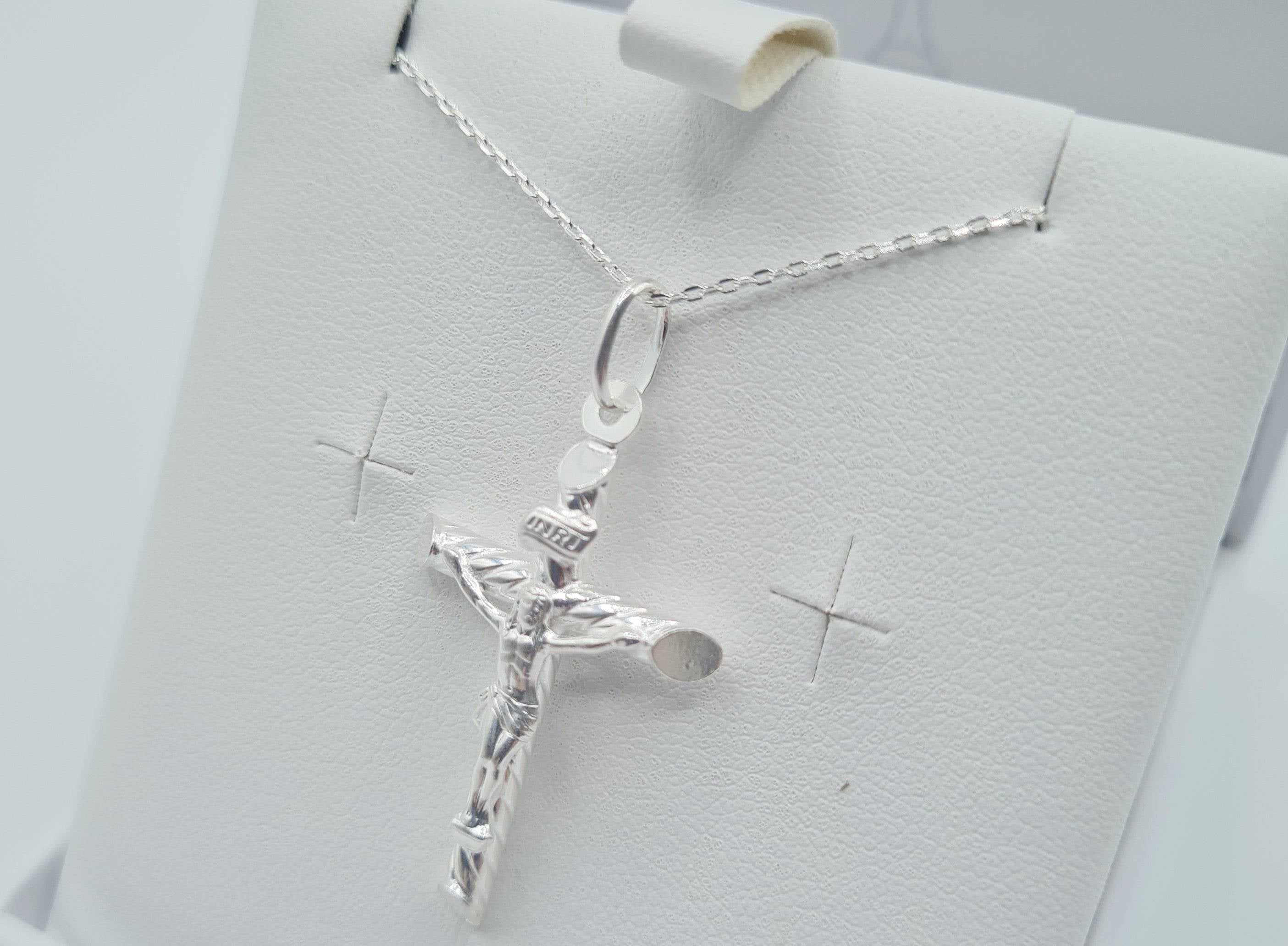 Close-up of sterling silver crucifix cross pendant - Communion or Confirmation gift