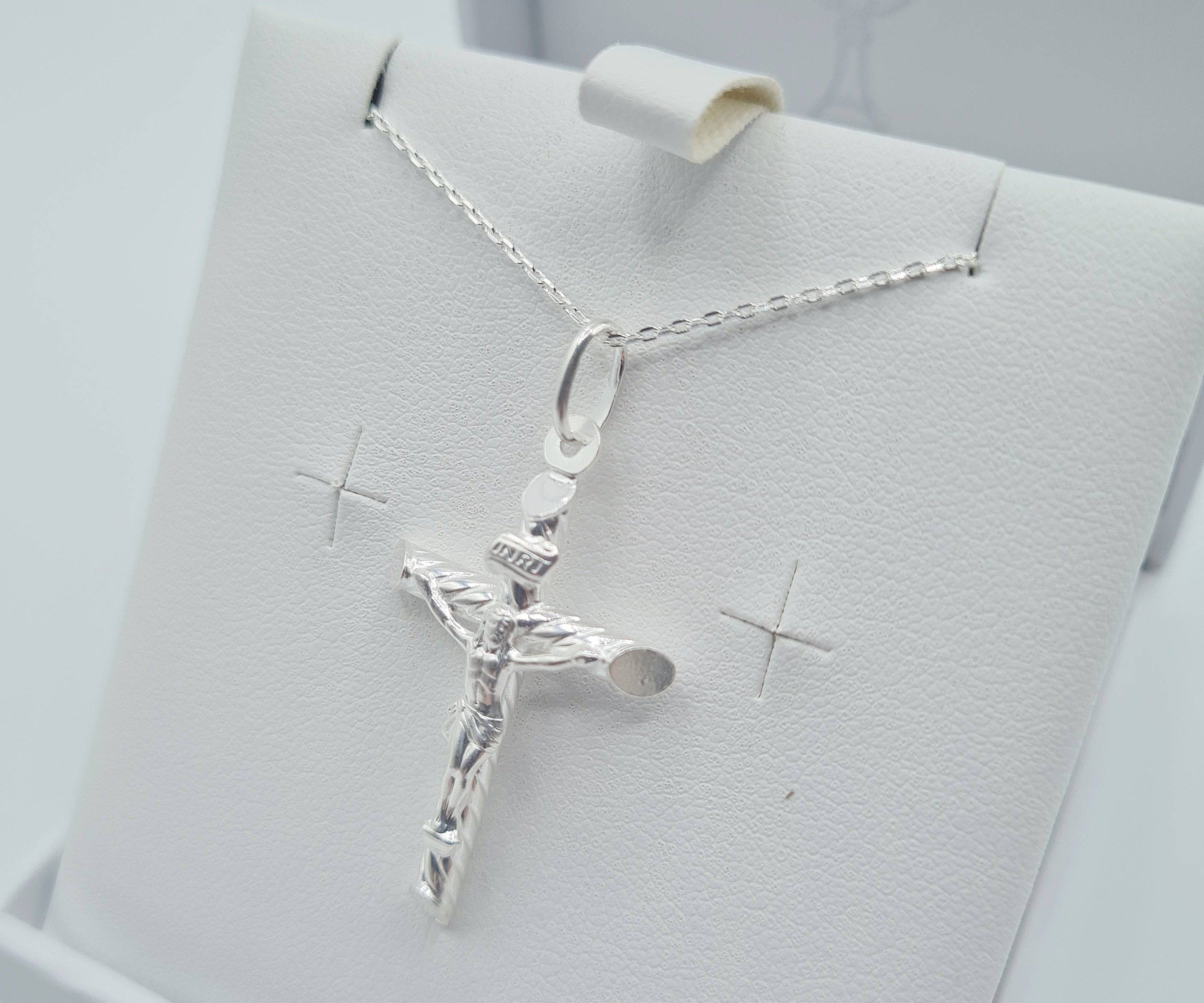 Close-up of sterling silver crucifix cross pendant - Communion or Confirmation gift