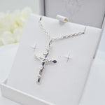 Boys or girls wearing the crucifix cross pendant and chain – Holy Communion or Confirmation gift