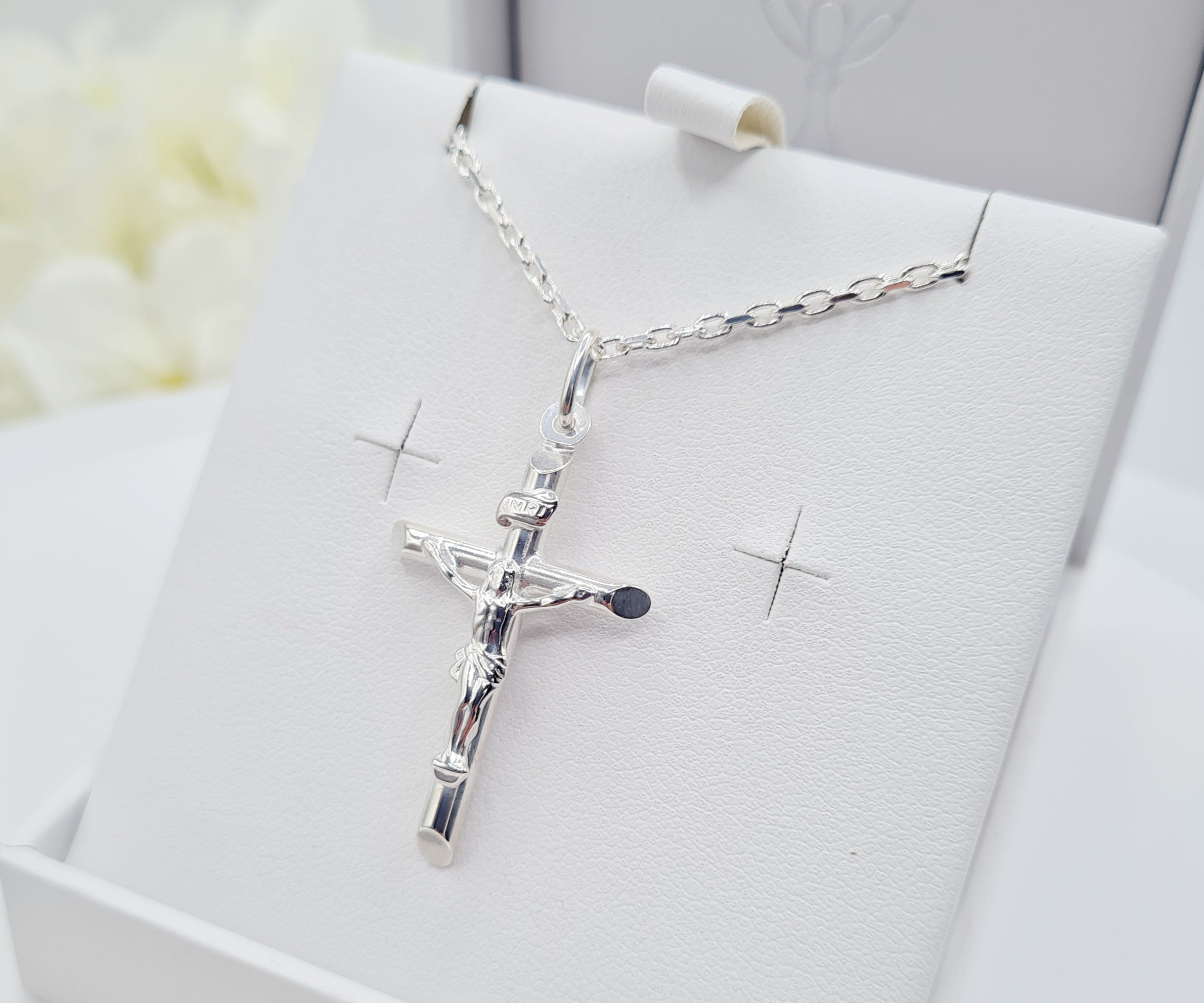 Boys or girls wearing the crucifix cross pendant and chain – Holy Communion or Confirmation gift