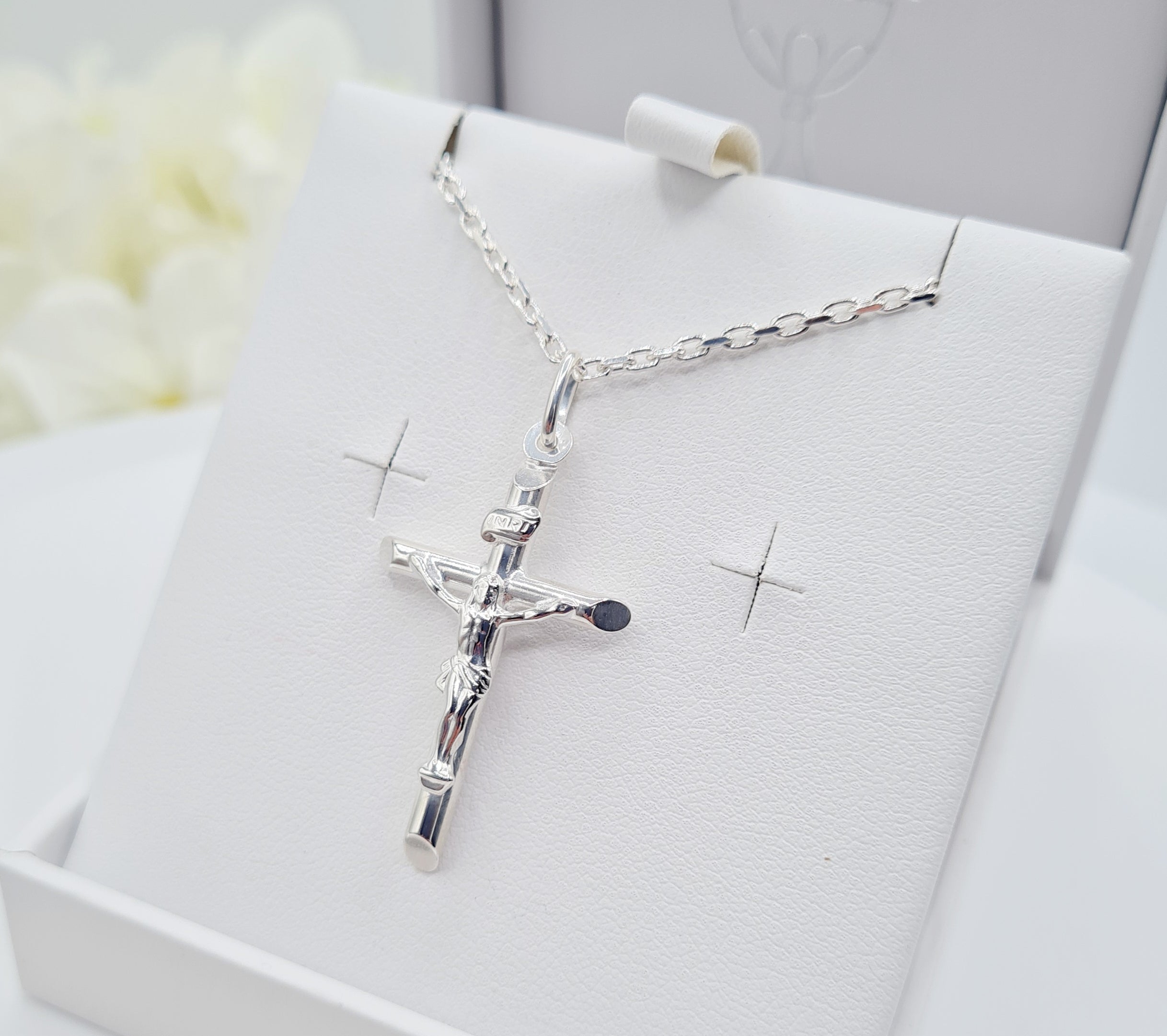 Boys or girls wearing the crucifix cross pendant and chain – Holy Communion or Confirmation gift