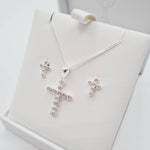 Close-up of sterling silver CZ cross pendant First Holy Communion or Confirmation