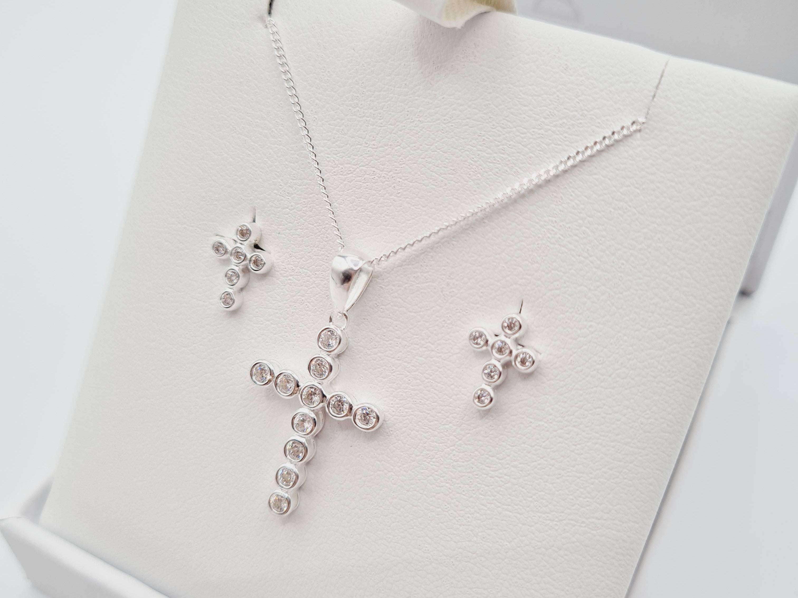 Close-up of sterling silver CZ cross pendant First Holy Communion or Confirmation