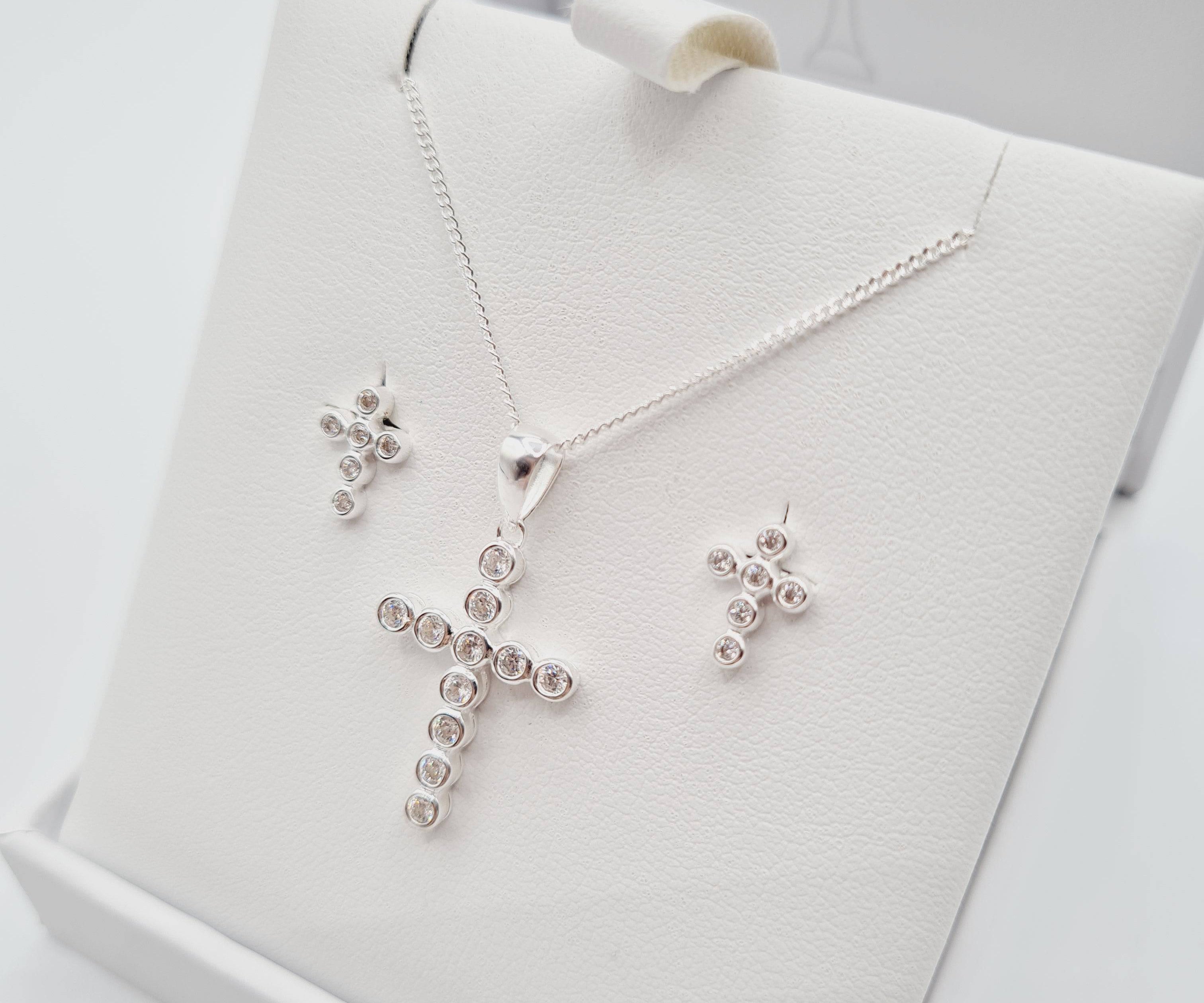 Close-up of sterling silver CZ cross pendant First Holy Communion or Confirmation