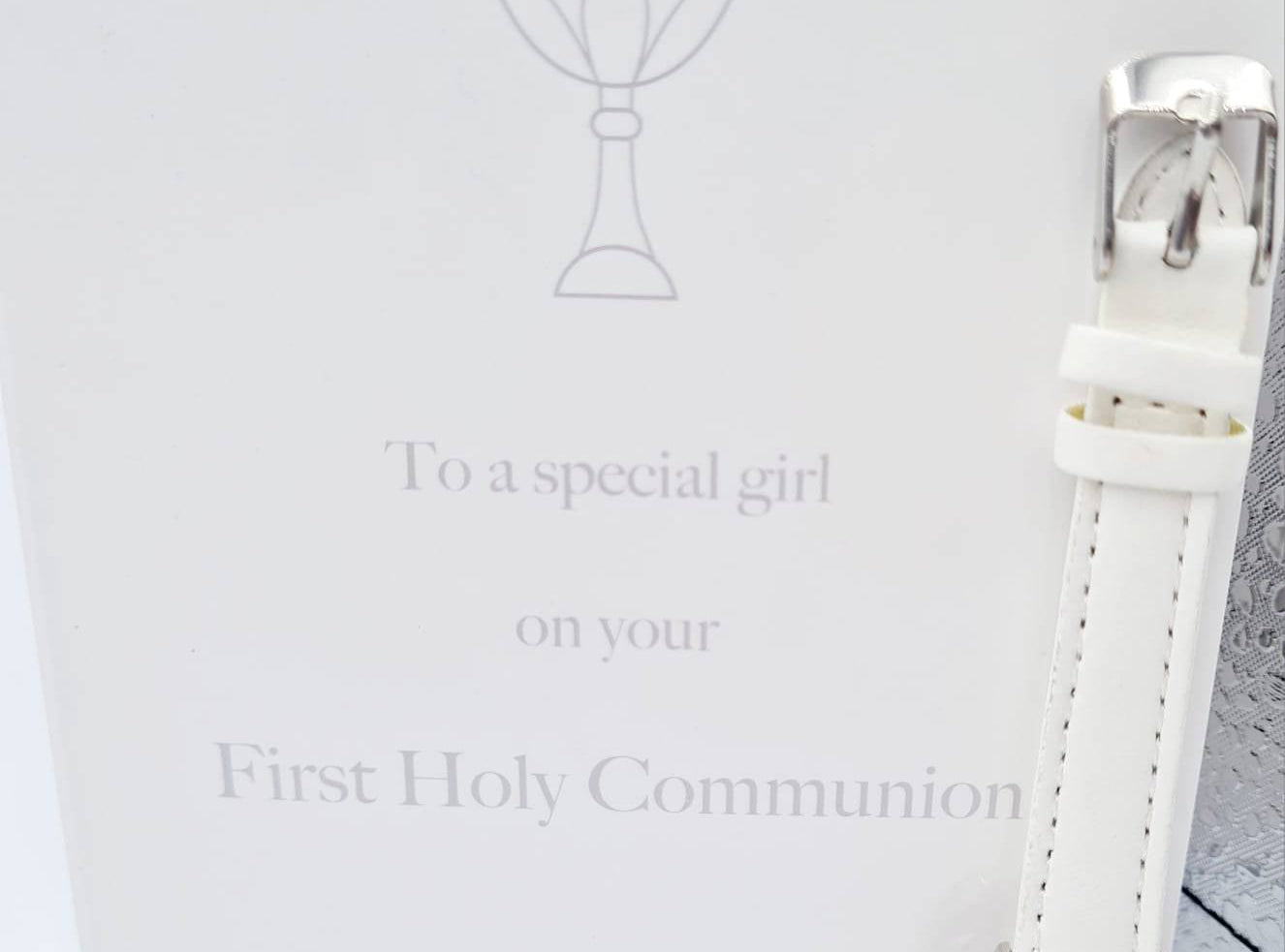 Comes in a beautiful white gift box Inscribed with a chalice logo and the wording 'First Holy Communion'