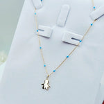 side view of 9ct Gold Little Boy Pendant on 9ct Gold Chain – Blue Enamel Detail